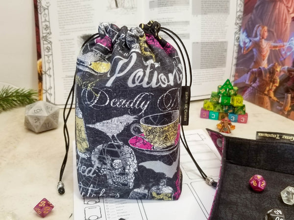 Halloween potions dice bag. Halloween print in black, metallic silver and purple with pops of gold.