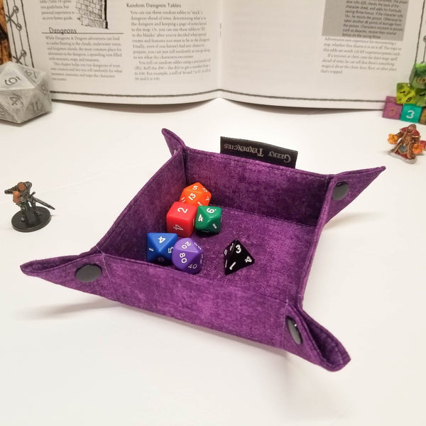 Small purple tray shown with dice for scale