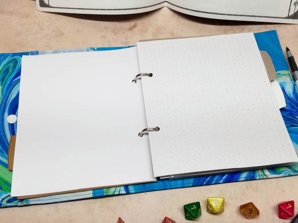 Players sidekick open to show dot-grid journaling pages