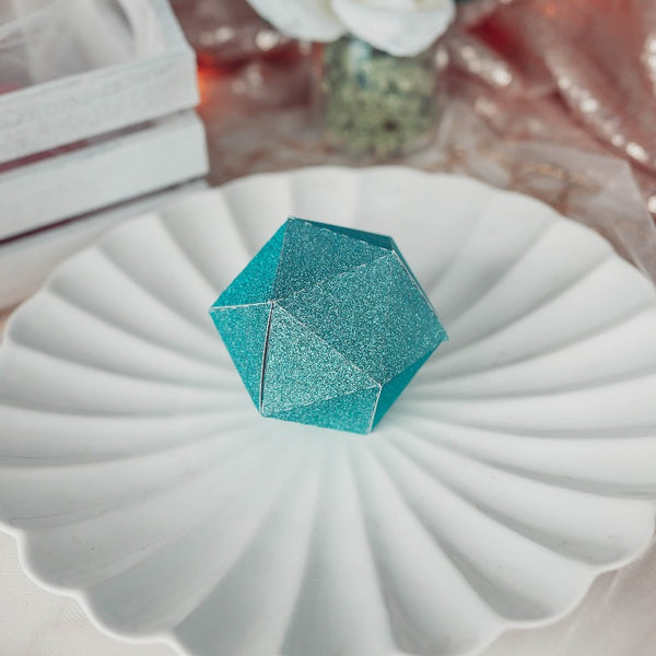 Aqua D20 favor box on a place setting