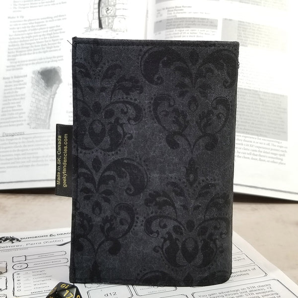 Tarot-sized spellbook in black damask back view.