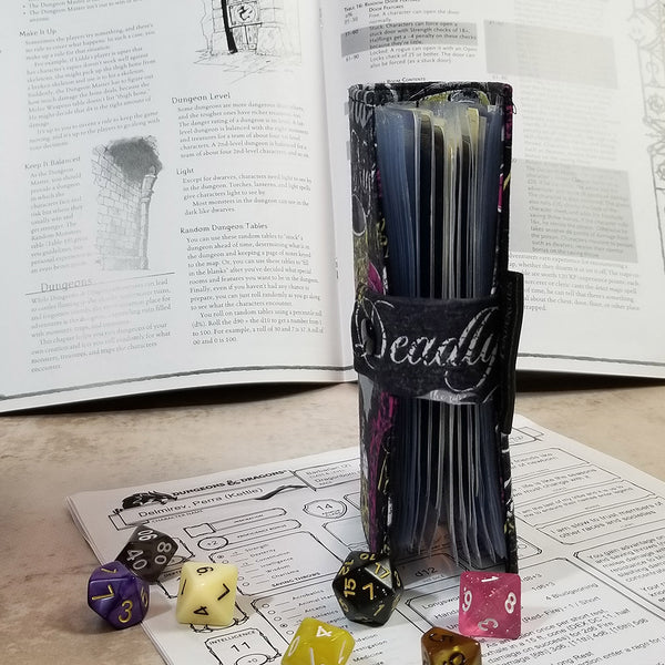 Side view of the halloween potions tarot-sized spellbook showing the closure and interior pages