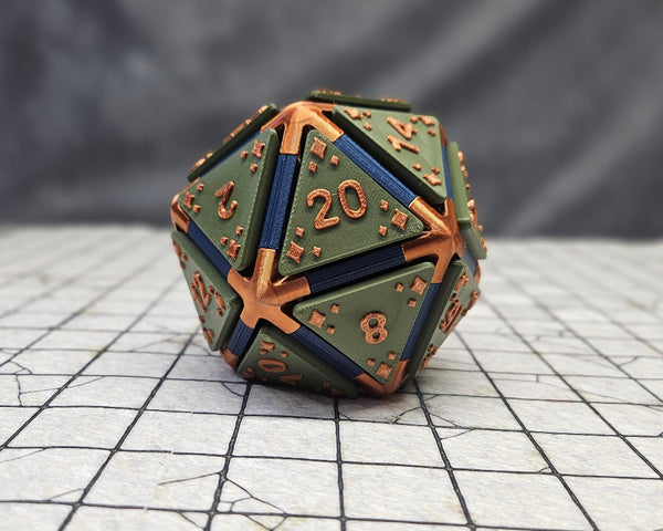 D20 fidget clicker in Green, Navy and bronze with raised text and sparkles. 
