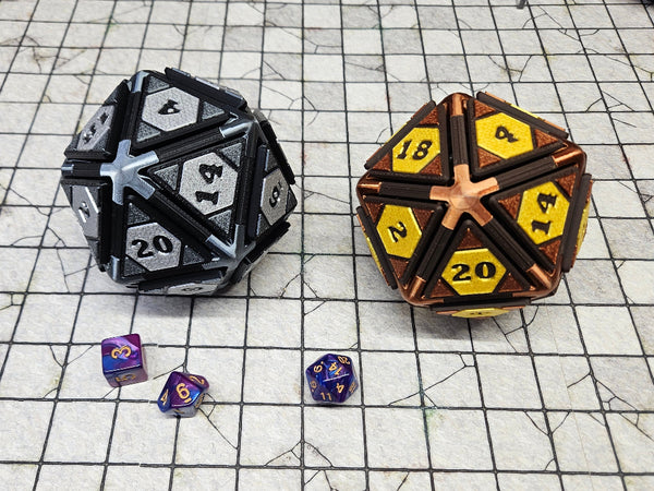 two D20 clickers with a hex face and corner triangles in silver theme and bronze theme. 