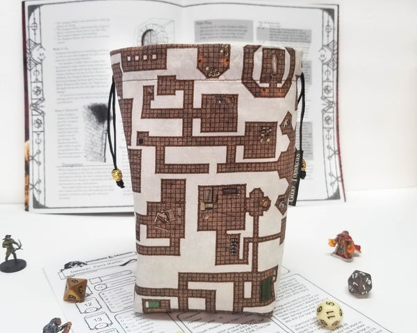 brown and cream dungeon map print dice bag. Front view with the bag open