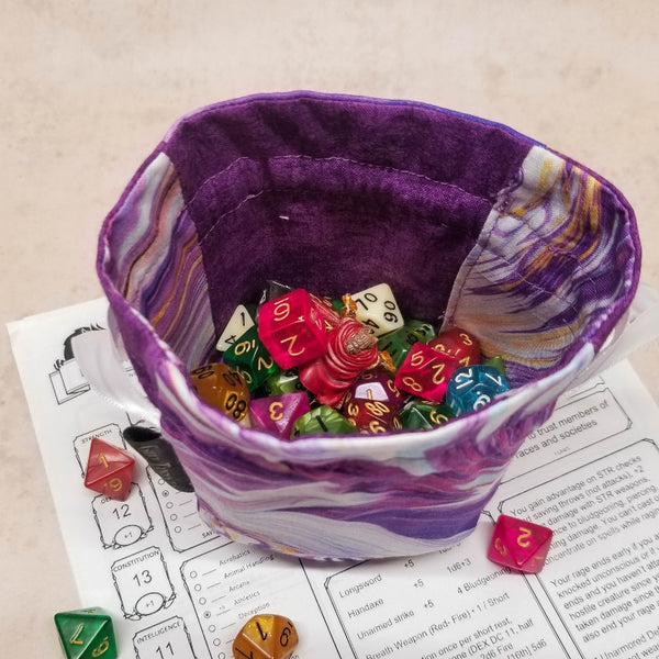 Inside of the small purple dice bag