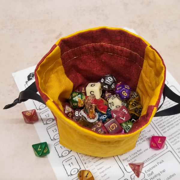 Inside of a red and yellow small dice bag