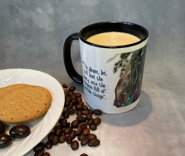 In use Cleric mug shown with coffee, cookies and coffee beans. 